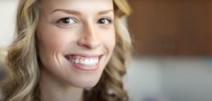 A close-up of a person smiling, Clear Aligners for Students: The Hassle-Free Way to a Great Smile