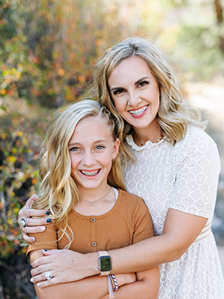 A person and a child posing for a picture