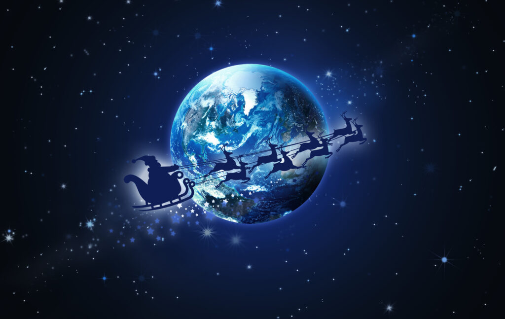 Santa Claus in a sleigh and reindeer sled flies over Earth against the background of the starry sky. Christmas night. Elements of this image are furnished by NASA, Braces-Friendly Holiday Treats: Global Delights for a Brighter Smile