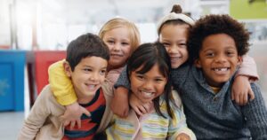 Growing Smiles Start Early: Celebrate Smiles at 7 Day with Orthodontic Specialists, A group of children smiling