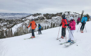Winter Sports Braces Safety: Protecting Your Smile with Orthodontic Specialists, People skiing on a snowy mountain